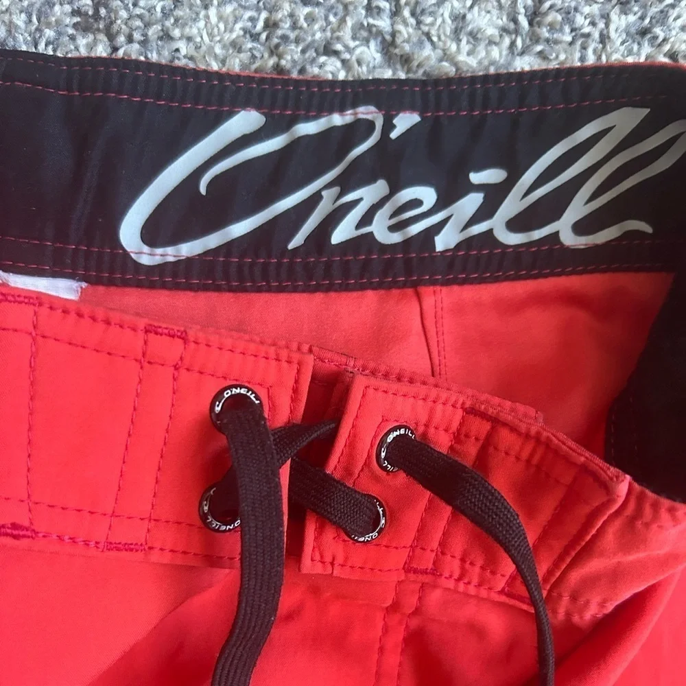 O’Neil Men’s Swim Trunks in red/orange color size 28